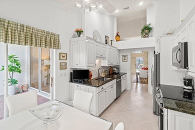 Don't miss this beautiful and inviting one-story townhome on Polo Club of Boca Raton in Florida - for sale on GolfHomes.com, golf home, golf lot