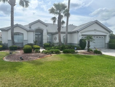Great 3/2 Hampton Model on the Pond in Tamarron with a view to on Eagle Ridge At Spruce Creek Country Club in Florida - for sale on GolfHomes.com, golf home, golf lot