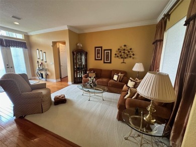 Great 3/2 Hampton Model on the Pond in Tamarron with a view to on Eagle Ridge At Spruce Creek Country Club in Florida - for sale on GolfHomes.com, golf home, golf lot