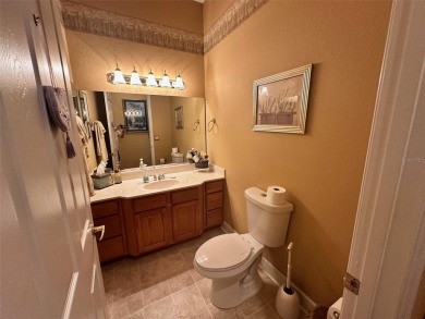 Great 3/2 Hampton Model on the Pond in Tamarron with a view to on Eagle Ridge At Spruce Creek Country Club in Florida - for sale on GolfHomes.com, golf home, golf lot