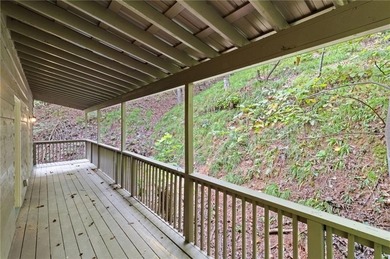 Welcome to charming *Creekside Cabin* tucked away in the on Big Canoe Golf Club - Cherokee in Georgia - for sale on GolfHomes.com, golf home, golf lot