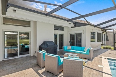 Experience the pinnacle of coastal living at 715 Indigo Loop on Emerald Bay Golf Club in Florida - for sale on GolfHomes.com, golf home, golf lot