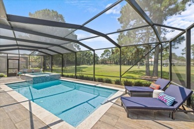 Experience the pinnacle of coastal living at 715 Indigo Loop on Emerald Bay Golf Club in Florida - for sale on GolfHomes.com, golf home, golf lot