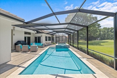 Experience the pinnacle of coastal living at 715 Indigo Loop on Emerald Bay Golf Club in Florida - for sale on GolfHomes.com, golf home, golf lot