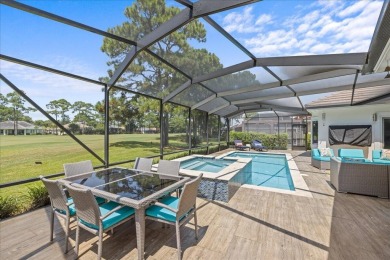 Experience the pinnacle of coastal living at 715 Indigo Loop on Emerald Bay Golf Club in Florida - for sale on GolfHomes.com, golf home, golf lot