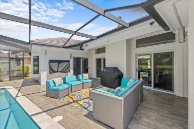 Experience the pinnacle of coastal living at 715 Indigo Loop on Emerald Bay Golf Club in Florida - for sale on GolfHomes.com, golf home, golf lot