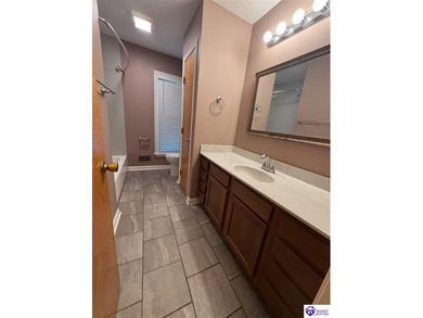 The perfect blend of space, comfort, and location in the highly on Doe Valley Country Club in Kentucky - for sale on GolfHomes.com, golf home, golf lot