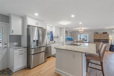 Welcome Home to this beautifully updated house in a desirable on Fairway Village Golf Course in Florida - for sale on GolfHomes.com, golf home, golf lot