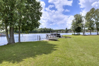 Immaculate LAKE ARBU WATERFRONT HOME on a cul-de-sac in gated on Players Course At Wyboo Plantation in South Carolina - for sale on GolfHomes.com, golf home, golf lot