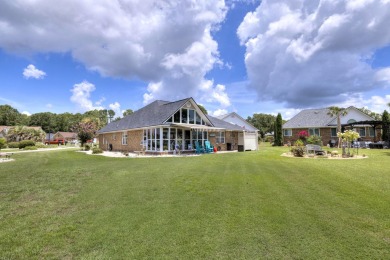 Immaculate LAKE ARBU WATERFRONT HOME on a cul-de-sac in gated on Players Course At Wyboo Plantation in South Carolina - for sale on GolfHomes.com, golf home, golf lot