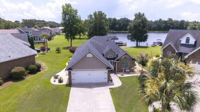 Immaculate LAKE ARBU WATERFRONT HOME on a cul-de-sac in gated on Players Course At Wyboo Plantation in South Carolina - for sale on GolfHomes.com, golf home, golf lot