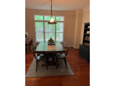 This beautiful brick home is nestled along the 14th hole of on Indian Trace Golf Course in Georgia - for sale on GolfHomes.com, golf home, golf lot