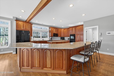 Welcome to this immaculate 4-bedroom LAKEFRONT home in the on Lords Valley Country Club, Inc in Pennsylvania - for sale on GolfHomes.com, golf home, golf lot