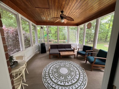 This beautiful brick home is nestled along the 14th hole of on Indian Trace Golf Course in Georgia - for sale on GolfHomes.com, golf home, golf lot