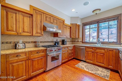 Experience mountain elegance in this luxurious three-bedroom on Canyons Golf Course in Utah - for sale on GolfHomes.com, golf home, golf lot