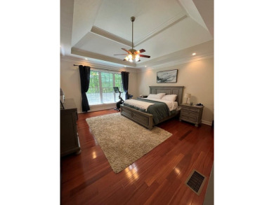 This beautiful brick home is nestled along the 14th hole of on Indian Trace Golf Course in Georgia - for sale on GolfHomes.com, golf home, golf lot