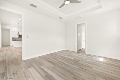 This home has all of the boxes checked!  Built 2022! Split on Royal Tee Country Club in Florida - for sale on GolfHomes.com, golf home, golf lot