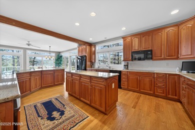 Welcome to this immaculate 4-bedroom LAKEFRONT home in the on Lords Valley Country Club, Inc in Pennsylvania - for sale on GolfHomes.com, golf home, golf lot