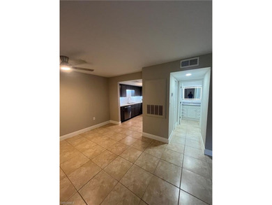 Beautifully Renovated FIRST FLOOR, CORNER UNIT with private on Fountain Lakes Community Golf Course in Florida - for sale on GolfHomes.com, golf home, golf lot
