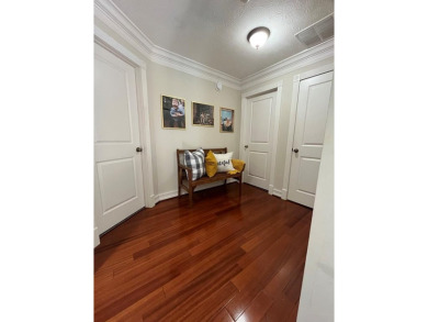 This beautiful brick home is nestled along the 14th hole of on Indian Trace Golf Course in Georgia - for sale on GolfHomes.com, golf home, golf lot