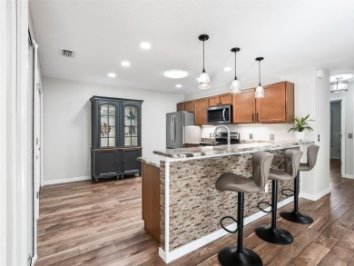 *EXCEPTIONAL* Absolutely beautiful villa in The Villages of St on The Links of Spruce Creek in Florida - for sale on GolfHomes.com, golf home, golf lot