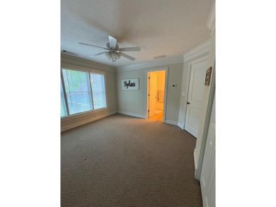 This beautiful brick home is nestled along the 14th hole of on Indian Trace Golf Course in Georgia - for sale on GolfHomes.com, golf home, golf lot