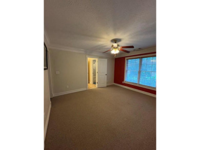 This beautiful brick home is nestled along the 14th hole of on Indian Trace Golf Course in Georgia - for sale on GolfHomes.com, golf home, golf lot