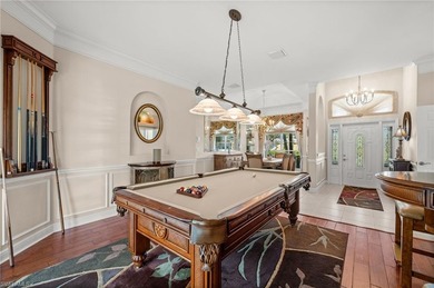 Looking for a meticulously maintained pool home, offered turnkey on Lely Resort Golf and Country Club in Florida - for sale on GolfHomes.com, golf home, golf lot