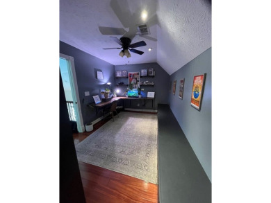 This beautiful brick home is nestled along the 14th hole of on Indian Trace Golf Course in Georgia - for sale on GolfHomes.com, golf home, golf lot