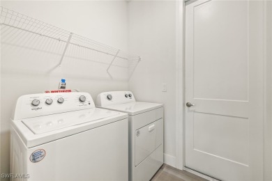 This home has all of the boxes checked!  Built 2022! Split on Royal Tee Country Club in Florida - for sale on GolfHomes.com, golf home, golf lot