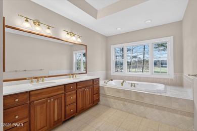 Welcome to this immaculate 4-bedroom LAKEFRONT home in the on Lords Valley Country Club, Inc in Pennsylvania - for sale on GolfHomes.com, golf home, golf lot