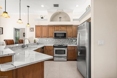 Looking for a meticulously maintained pool home, offered turnkey on Lely Resort Golf and Country Club in Florida - for sale on GolfHomes.com, golf home, golf lot