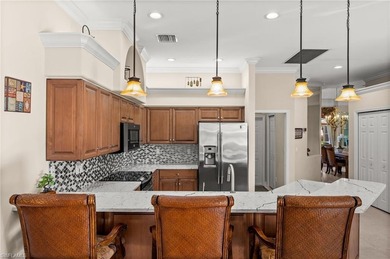 Looking for a meticulously maintained pool home, offered turnkey on Lely Resort Golf and Country Club in Florida - for sale on GolfHomes.com, golf home, golf lot