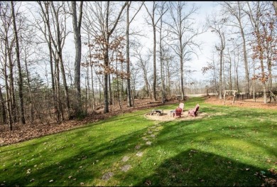This beautiful brick home is nestled along the 14th hole of on Indian Trace Golf Course in Georgia - for sale on GolfHomes.com, golf home, golf lot
