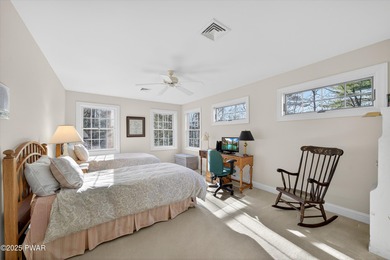 Welcome to this immaculate 4-bedroom LAKEFRONT home in the on Lords Valley Country Club, Inc in Pennsylvania - for sale on GolfHomes.com, golf home, golf lot