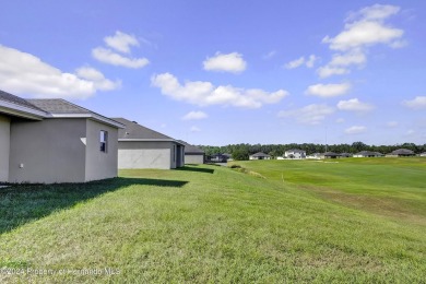 The scenic vistas of Sherman Hills Golf Club serve as a serene on Sherman Hills Golf Club in Florida - for sale on GolfHomes.com, golf home, golf lot