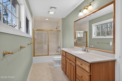 Welcome to this immaculate 4-bedroom LAKEFRONT home in the on Lords Valley Country Club, Inc in Pennsylvania - for sale on GolfHomes.com, golf home, golf lot