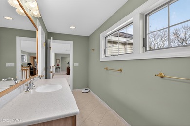 Welcome to this immaculate 4-bedroom LAKEFRONT home in the on Lords Valley Country Club, Inc in Pennsylvania - for sale on GolfHomes.com, golf home, golf lot