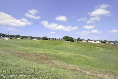 The scenic vistas of Sherman Hills Golf Club serve as a serene on Sherman Hills Golf Club in Florida - for sale on GolfHomes.com, golf home, golf lot