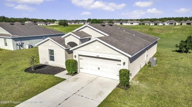 The scenic vistas of Sherman Hills Golf Club serve as a serene on Sherman Hills Golf Club in Florida - for sale on GolfHomes.com, golf home, golf lot