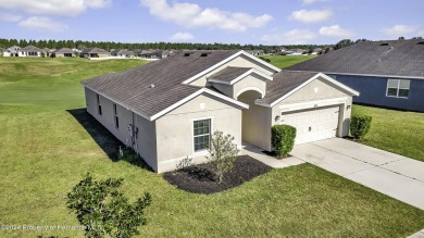 The scenic vistas of Sherman Hills Golf Club serve as a serene on Sherman Hills Golf Club in Florida - for sale on GolfHomes.com, golf home, golf lot