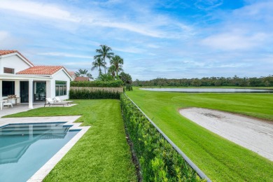 Located behind the manned security gate of the exclusive Palm on Palm Beach Polo and Country Club in Florida - for sale on GolfHomes.com, golf home, golf lot