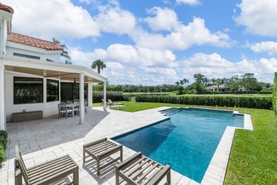 Located behind the manned security gate of the exclusive Palm on Palm Beach Polo and Country Club in Florida - for sale on GolfHomes.com, golf home, golf lot