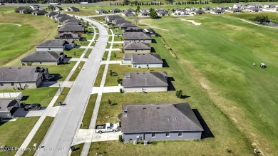 The scenic vistas of Sherman Hills Golf Club serve as a serene on Sherman Hills Golf Club in Florida - for sale on GolfHomes.com, golf home, golf lot