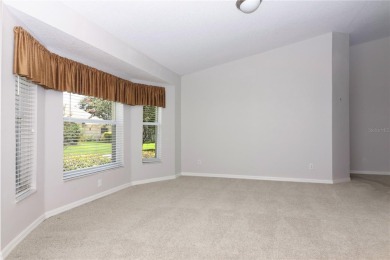 Spacious and well-designed, this Princess model sits proudly on on Monarch At Royal Highlands in Florida - for sale on GolfHomes.com, golf home, golf lot