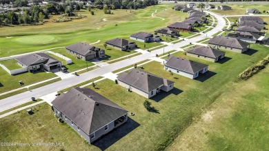 The scenic vistas of Sherman Hills Golf Club serve as a serene on Sherman Hills Golf Club in Florida - for sale on GolfHomes.com, golf home, golf lot