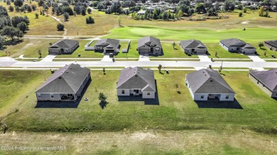 The scenic vistas of Sherman Hills Golf Club serve as a serene on Sherman Hills Golf Club in Florida - for sale on GolfHomes.com, golf home, golf lot