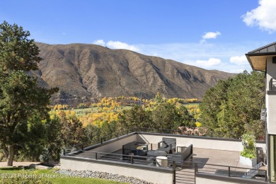 Newly remodeled in 2021, this luxury estate on 3.5 acres is on The Roaring Fork Club in Colorado - for sale on GolfHomes.com, golf home, golf lot