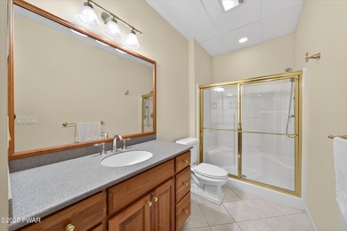 Welcome to this immaculate 4-bedroom LAKEFRONT home in the on Lords Valley Country Club, Inc in Pennsylvania - for sale on GolfHomes.com, golf home, golf lot