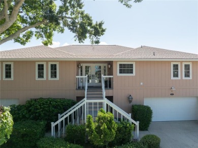 THE INTANGIBLE VALUE OF THIS 3 BEDROOM 2 FULL BATH, 2 HALF BATH on Mangrove Bay Golf Course in Florida - for sale on GolfHomes.com, golf home, golf lot